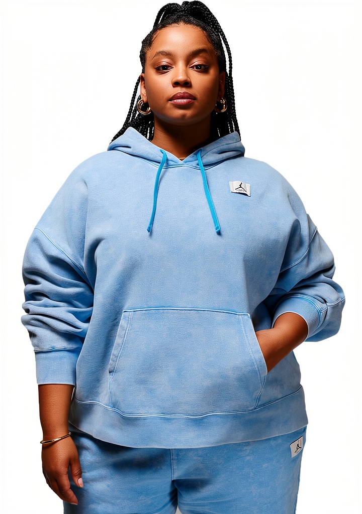 Nike women's hoodie in dark powder blue worn during a casual outdoor activity