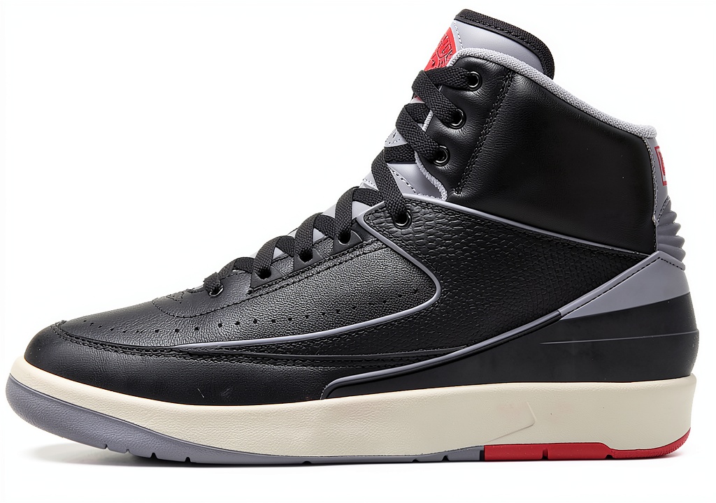 Jordan 2 Retro Shoes in Black Cement Grey color on a basketball court